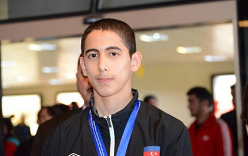 Mammadov stricking taekwondo silver medal